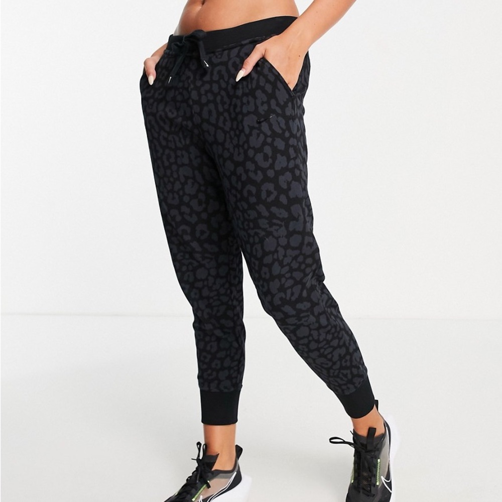Nike Training Dri-FIT leopard print cuffed sweatpants in black